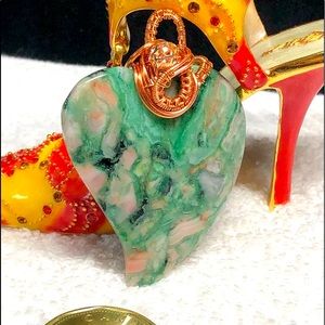 Pretty wire wrapped green heart stone